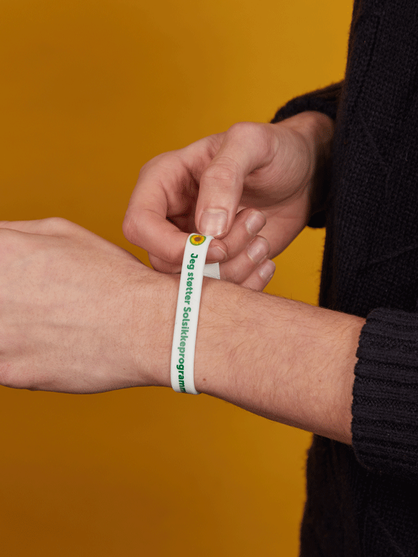 mand med jeg støtter solsikkeprogrammet armbånd om håndleddet