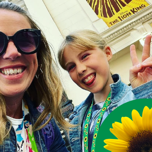 Clare and Matilda are wearing Sunflower lanyards and smiling
