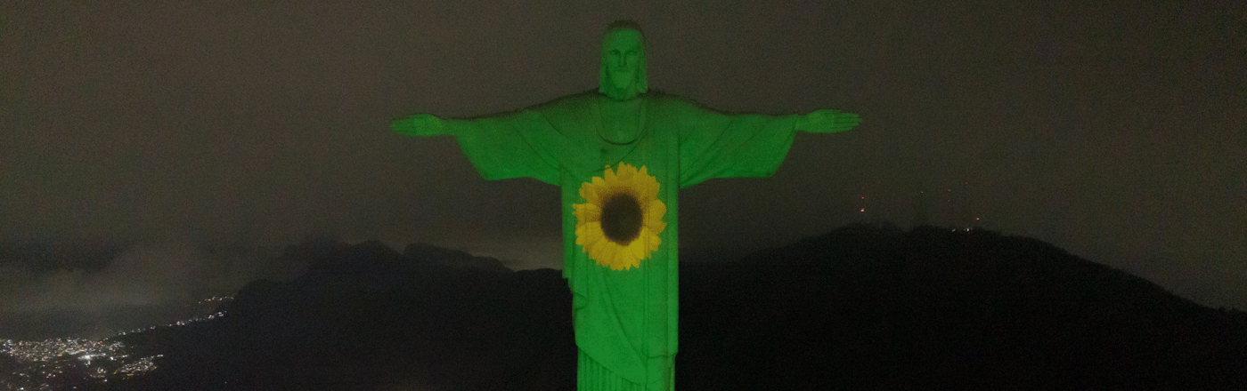 Cordão de Girassol e Cristo Redentor: Representando a Diversidade
