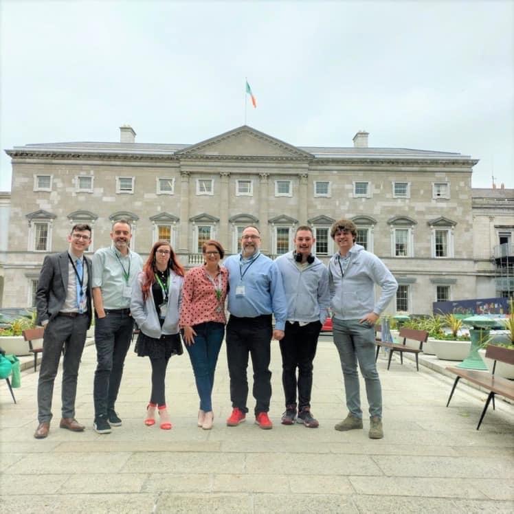 The Hidden Disabilities Ireland team stand in front of Leinster House