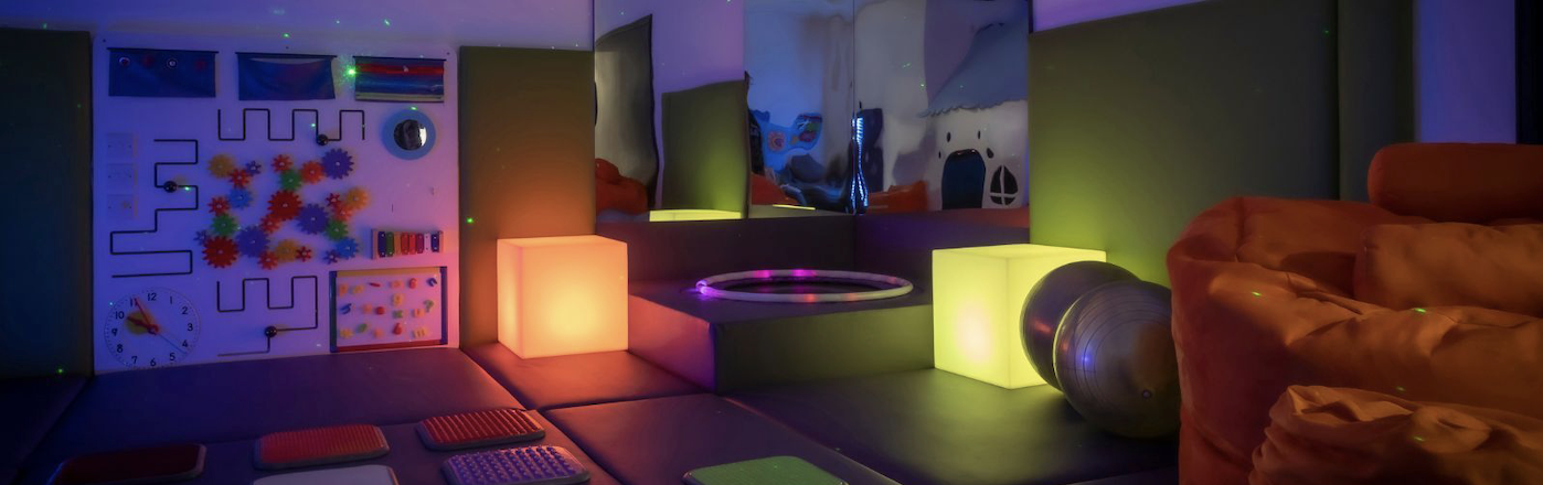 A sensory room at the Pillo hotel. Filled with lots of colourful, different textured items 